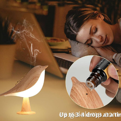 Mesa de luz nocturna LED creativa para pájaros